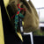 Close up image of the JOOLA Scorpeus Pro IV keychain hanging from a bag.