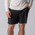 Close up image of a pair of JOOLA men's club shorts, black.