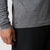 Close up image of the raised JOOLA logo on the side of a JOOLA men's quarter zip pullover, charcoal heather.
