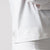 Close up image of the JOOLA tag logo on the JOOLA Women's Quarter Zip Pullover, White.