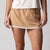 Gray background, close up on the JOOLA women's club skort, latte color and print.