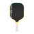 Pickleball paddle with black paddle face, yellow rim, and white handle on a white background.