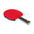 White background, red JOOLA table tennis racket with a black handle and yellow JOOLA Trinity logo on the handle.