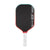 Pickleball paddle with black surface, red border, and white handle on a white background