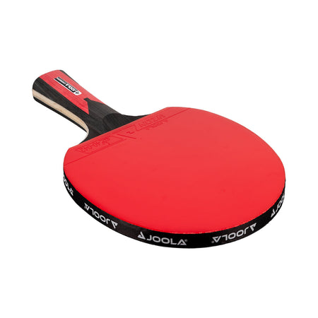 White background, angled view of the JOOLA Carbon Table Tennis Racket, black and red handle and a red racket face.