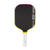 Pickleball paddle with black surface, yellow rim, and white handle on a white background.