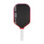 Pickleball paddle with black surface, red border, and white handle on a white background