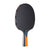Table tennis paddle with black surface and orange handle on a white background.