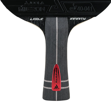 White background, close up image of the Infinity Z Carbon Table Tennis Racket with black gray and red handle.