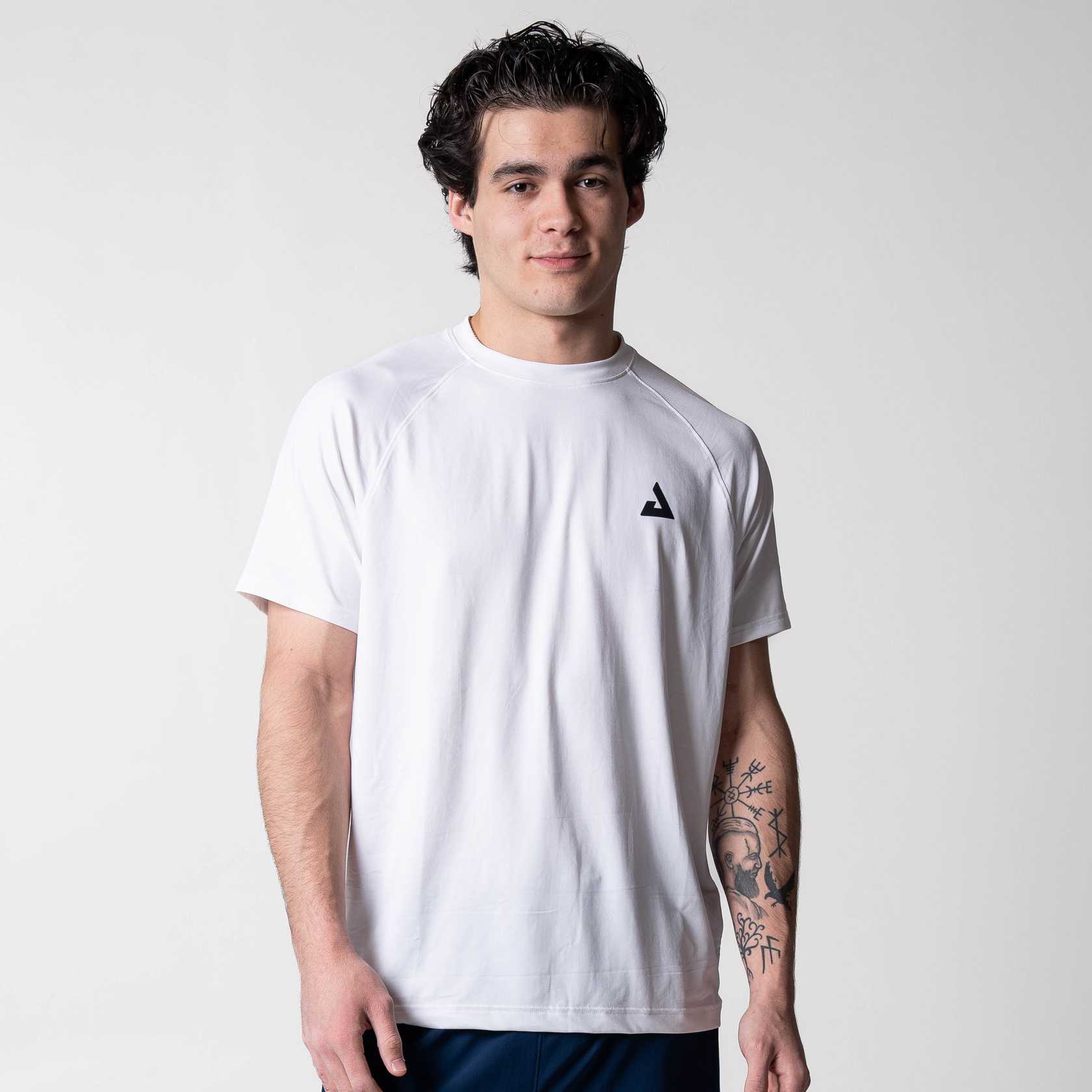 Gray background, image of a model wearing a White Court Short Sleeve shirt.