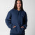 Gray background, image of a female model wearing a JOOLA Fleece Hoodie, Navy.