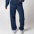Gray background, image of a model wearing JOOLA Fleece pants (Navy).