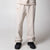 Gray background, image of a pair of sandstone colored JOOLA fleece pants.