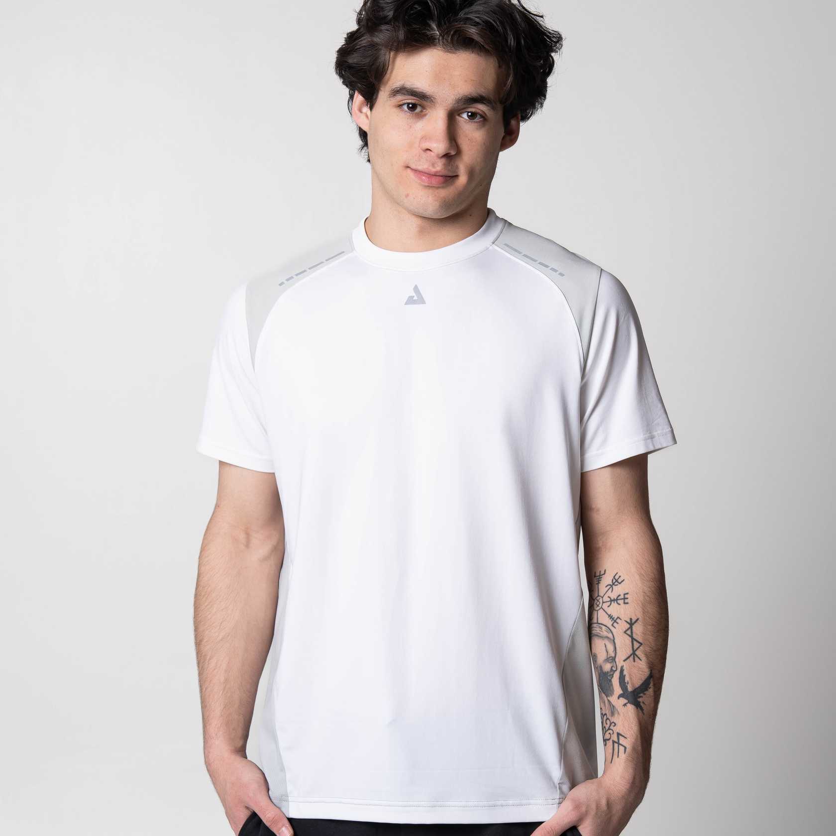 Gray background, image of a model wearing a JOOLA Hybrid short sleeve shirt, white.