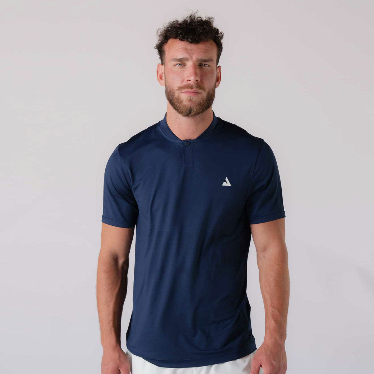 Image showing a male model wearing a JOOLA men's court polo, navy.