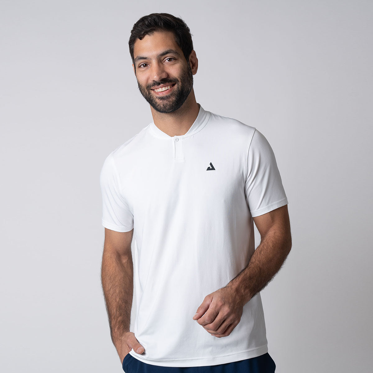 Gray background, image of a male model wearing a JOOLA Men's Court Polo, white.
