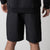 Image showing the back of a pair of JOOLA Men's Woven Shorts with a nine-inch inseam, black.
