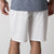 Image showing the back of a pair of JOOLA Men's Woven Shorts with nine-inch inseam, white.