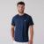 Gray background, image of a male model wearing a men's court short sleeve, navy.