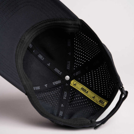 White background, product image of the inside of the JOOLA Perforated Cap, black.