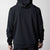 JOOLA Black hoodie on a plain background