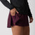 Close up image showing the hidden pocket on the side of a JOOLA Women's Pickleball Skort, Bordeaux.