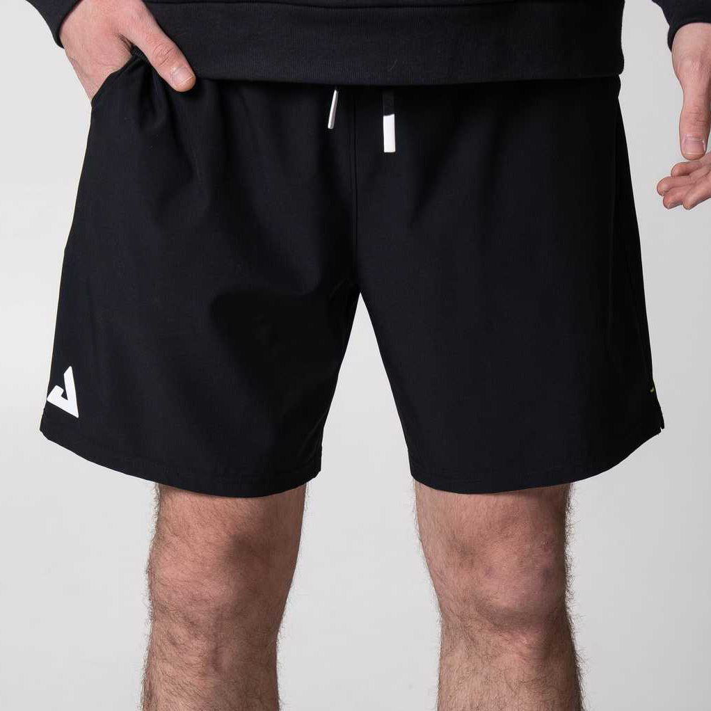 Gray background, close up image of the JOOLA Men's Woven Shorts, black, 7-inch inseam.